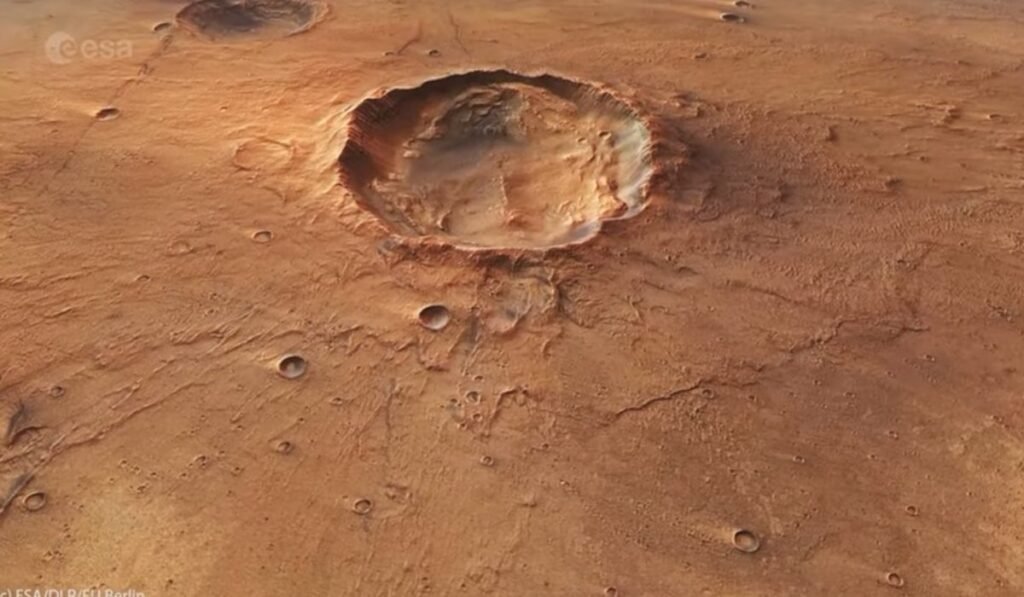 Γιγάντια «πεταλούδα» στον Άρη: Ο μυστηριώδης κρατήρας που αποκαλύπτει το υδάτινο και βίαιο παρελθόν του Κόκκινου Πλανήτη Μεγάλος κρατήρας στην επιφάνεια του Άρη
